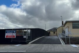 A new drive way provides ambulance entry to the Urgent Care Centre. There is signage on the fence next to the entry provides directions to the public.