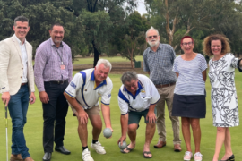 Group of men and women ready for Golf day action.