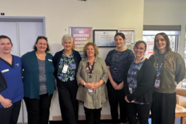one student and six female midwives